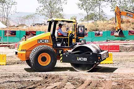 JCB displays road construction equipment at Pune