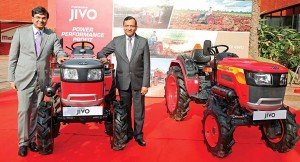 R - L Dr. Pawan Goenka Managing Director MM Ltd and Rajesh Jejurikar President Farm Equipment Sector MM Ltd at the launch of Mahindras new tra copy
